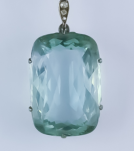 An Aquamarine Pendant, Late 19th/ Early 20th Century, silver coloured metal set with a faceted