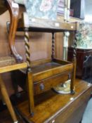 AN OAK TWO TIER DINNER WAGON, WITH SPIRAL COLUMNS, DRAWER BELOW