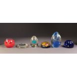 CAITHNESS ?INFERNO? GLASS PAPERWEIGHT, and FIVE OTHERS, including a cone shaped example with