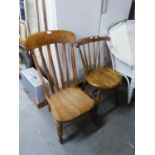 AN OAK NURSING CHAIR AND A SPINDLE BACK DINING  CHAIR WITH CIRCULAR SEAT (2)