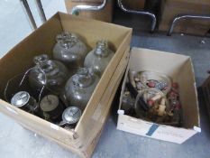 FOUR GLASS DEMI JOHNS FOR WINE MAKING, VARIOUS WOODEN BARREL TAPS AND THREE PARAFFIN LANTERNS