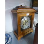 A MODERN MAHOGANY CASED BRACKET CLOCK WITH SQUARE BRASS AND SILVERED DIAL, STRIKING AND CHIMING