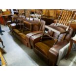 ART DECO PERIOD SEMI-WINGED LOUNGE SUITE OF THREE PIECES, COVERED IN BROWN HID WITH WALNUT WOOD