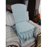 AN ARMLESS BOUDOIR EASY CHAIR, IN PALE BLUE FABRIC, THE BOX SEAT WITH LIFT-UP LID