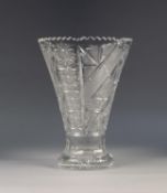 AN INTER WAR YEARS CUT GLASS TRUMPET SHAPE VASE with serrated rim and star cut base 12 1/2" (31.5)