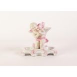 EARLY TWENTIETH CENTURY CONTINENTAL PRESS MOULDED PORCELAIN FIGURAL DOUBLE SALT STAND, white