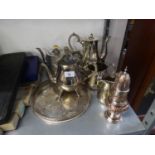 A SELECTION OF VICTORIAN AND LATER ELECTROPLATE TO INCLUDE; A THREE PIECE TEA SERVICE, TEAPOT, SUGAR