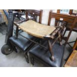 A PAIR OF OBLONG OAK FOOTSTOOLS WITH WOVEN TOPS ON TURNED SUPPORTS (2)