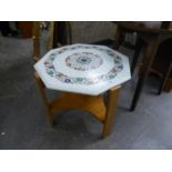 A LIGHT OAK OCCASIONAL TABLE SUPPORTING A WHITE MARBLE OCTAGONAL TOP WITH HARDSTONE AND MOTHER OF