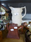 A GREY EMBOSSED POTTERY TALL JUG; A RED WARE TAPERED RECTANGULAR TEAPOT