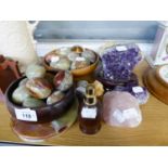 A LARGE AMMONITE FOSSIL, 6? WIDE; A SPECIMEN OF AMETHYST QUARTZ, ON OVAL STAND; TEN GREEN/BROWN ONYX