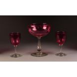 NINETEENTH CENTURY CRANBERRY GLASS PEDESTAL SUGAR BASIN, with clear, knopped stem and base, 7? (17.