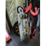 'CHARGER? CRICKET BAT; ?MONGOOSE? SKATE BOARD; A DART BOARD