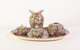 FOUR PIECE CROWN DUCAL FLORAL PRINTED POTTERY DRESSING TABLE SET AND THE MATCHING OVAL TRAY,