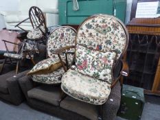 A PAIR OF ERCOL WHEEL BACK ARMCHAIRS, DITTO ROCKING CHAIR AND ANOTHER ERCOL LARGE ARMCHAIR (4)