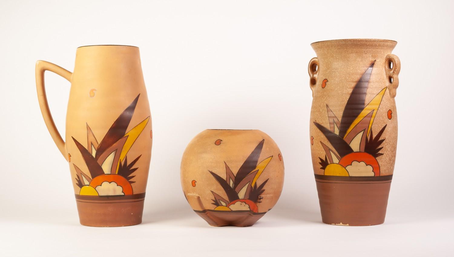 THREE BRENTLEIGH WARE ART DECO POTTERY VASES PAINTED IN MATCHING DESIGNS of stylised foliate on buff