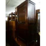 AN OAK MILLINERY CABINET AND MATCHING SUNK CENTRE DRESSING TABLE AND A STORE CUPBOARD (3)