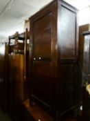 AN OAK MILLINERY CABINET AND MATCHING SUNK CENTRE DRESSING TABLE AND A STORE CUPBOARD (3)