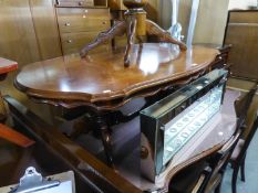 ITALIAN WALNUT AND MARQUETRY SHAPED OVAL COFFEE TABLE, ON TWO COLUMNS, EACH WITH TWO SWEPT SUPPORTS,