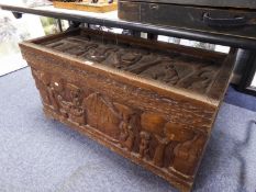 AN AFRICAN CARVED WOOD BEDDING BOX (HINGED TOP LOOSE)