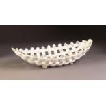 LATE 19th CENTURY, PROBABLY CONTINENTAL, PORCELLANEOUS HAND LATTICED BOAT SHAPE SHALLOW BOWL,