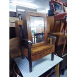 A CHILD?S STAINED WOOD EASY ARMCHAIR AND A STAINED WOOD MEDICINE CABINET WITH MIRROR DOOR