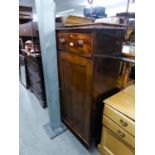 A MAHOGANY  CUPBOARD, HAVING TWO DRAWERS, WITH KNOB HANDLES OVER TWO PANEL DOORS (144cm high x