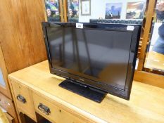 A TECHNIKA 21" FLAT SCREEN TV. (NO REMOTE)