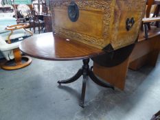 REGENCY STYLE DARK MAHOGANY OVAL PEMBROKE DINING TABLE, ON VASE SHAPED COLUMN AND REEDED QUARTETTE