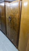 A GENTS 1930's ART DECO FIGURED WALNUTWOOD SEMI-FITTED WARDROBE