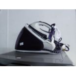 PHILIPS DOCKING STEAM IRON  AND A DELONGHI RADIATOR (2)