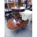 A REGENCY STYLE MAHOGANY OVAL OCCASIONAL TABLE, ON QUARTETTE SUPPORTS AND A CIRCULAR DRUM TOP
