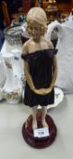 ART DECO BRONZE AND IVORINE FIGURE OF A YOUNG WOMAN IN 1920's STYLE DRESS, 11" HIGH (28cm) ON A