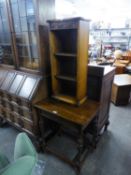 A SMALL CARVED OAK OPEN BOOKCASE AND AN OAK OBLONG OCCASIONAL TABLE, ON CARVED MELON BULB SUPPORTS