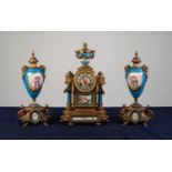 A LATE NINETEENTH CENTURY FRENCH GILDED SPELTER AND SEVRES STYLE PORCELAIN COMPOSITE THREE PIECE