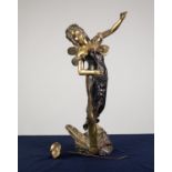 A TWENTIETH CENTURY POLISHED AND LACQUERED BRASS FEMALE FIGURE with butterfly wings rising from leaf