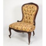 VICTORIAN CARVED MAHOGANY LADY?S CHAIR, the moulded and waisted back with floral cresting, enclosing