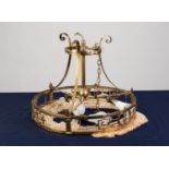 EDWARDIAN BRASS THREE LIGHT ELECTROLIER, with circular, pierced border and tasselled silk fringe,