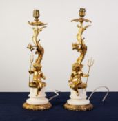 PAIR OF 20th CENTURY GILDED BRASS AND ALABASTER ELECTRIC TABLE LAMPS each with a cherub holding a