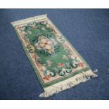 HEAVY QUALITY WASHED CHINESE RUG with embossed off-white and floral centre oval medallion and shaped
