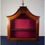 NINETEENTH CENTURY GLAZED WALNUT MURAL DISPLAY CABINET, the moulded pagoda top with brass flame