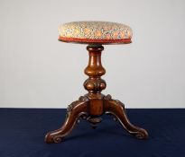 VICTORIAN CARVED ROSEWOOD PIANO STOOL, the circular, padded top, covered in orange and green