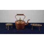 VICTORIAN COPPER KETTLE AND TWO PIERCED BRASS TRIVETS (3)