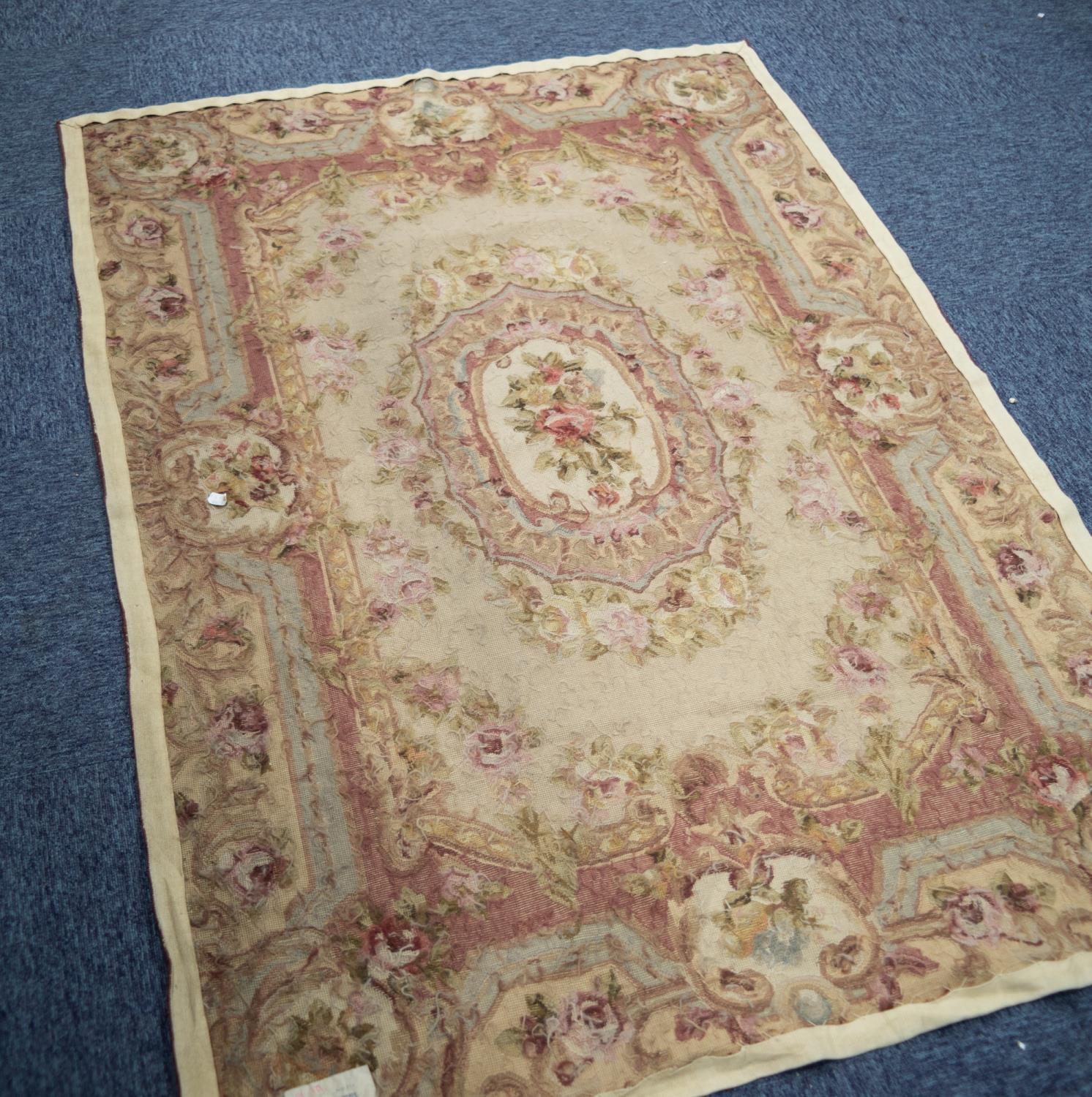 AUBUSSON NEEDLEWORK TAPESTRY RUG with centre oval rose decorated medallion on a fawn field, the - Image 2 of 2