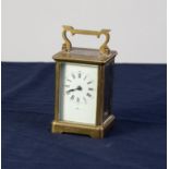 'KINGS COURT', TWENTIETH CENTURY BRASS CARRIAGE CLOCK, of typical form with white Roman dial and