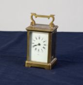 'KINGS COURT', TWENTIETH CENTURY BRASS CARRIAGE CLOCK, of typical form with white Roman dial and