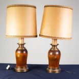 PAIR OF MODERN HEAVY TURNED WOOD TABLE LAMPS, with gilt metal collars and bases, and parchment