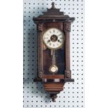 EARLY 20th CENTURY SMALL VIENNA STYLE CARVED AND EBONIZED WOOD WALL CLOCK with Junghans spring