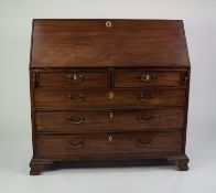 GEORGE III MAHOGANY LARGE BUREAU, of typical form, the interior well fitted with short drawers and