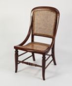 LATE VICTORIAN MAHOGANY STAINED FRUITWOOD NURSING CHAIR, the moulded show wood frame with